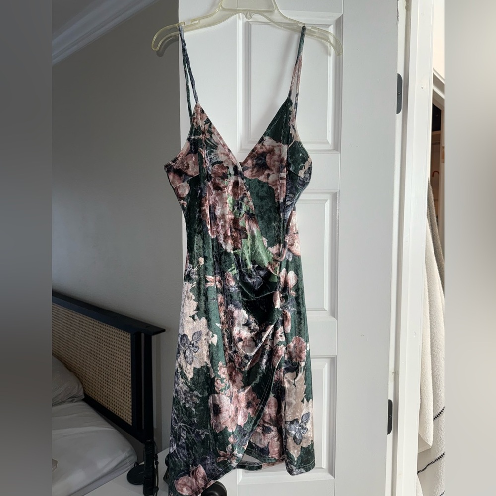 Very cute, form fitting, suede cocktail dress.